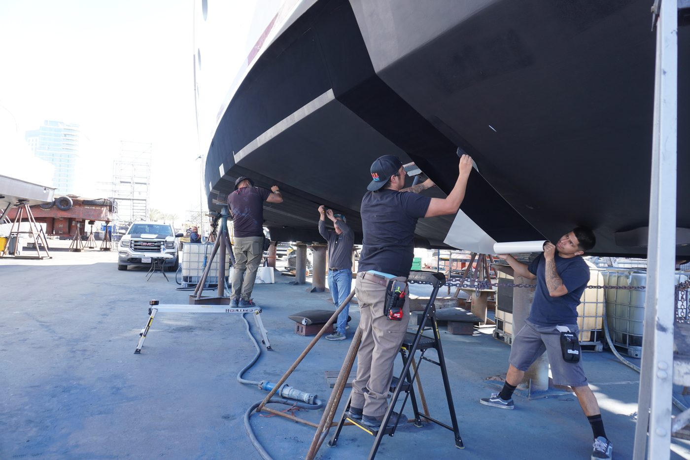 Wrap installation work at a shipyard